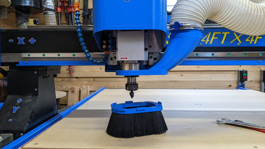 Phantom CNC dust boot with magnetic brush skirt detached below spindle for tool setting