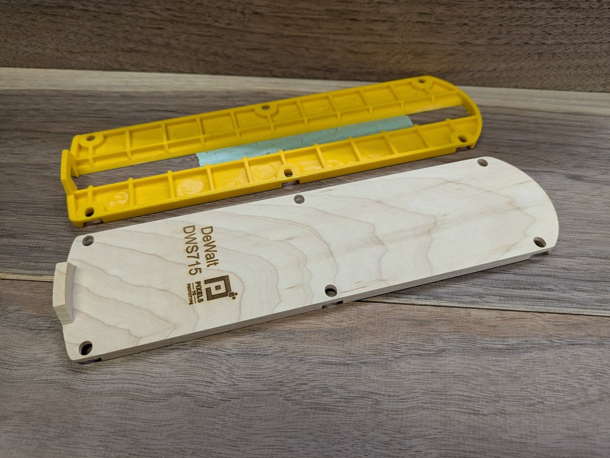 Maple DeWalt DWS715 zero clearance insert next to the yellow factory kerf plate it replaces