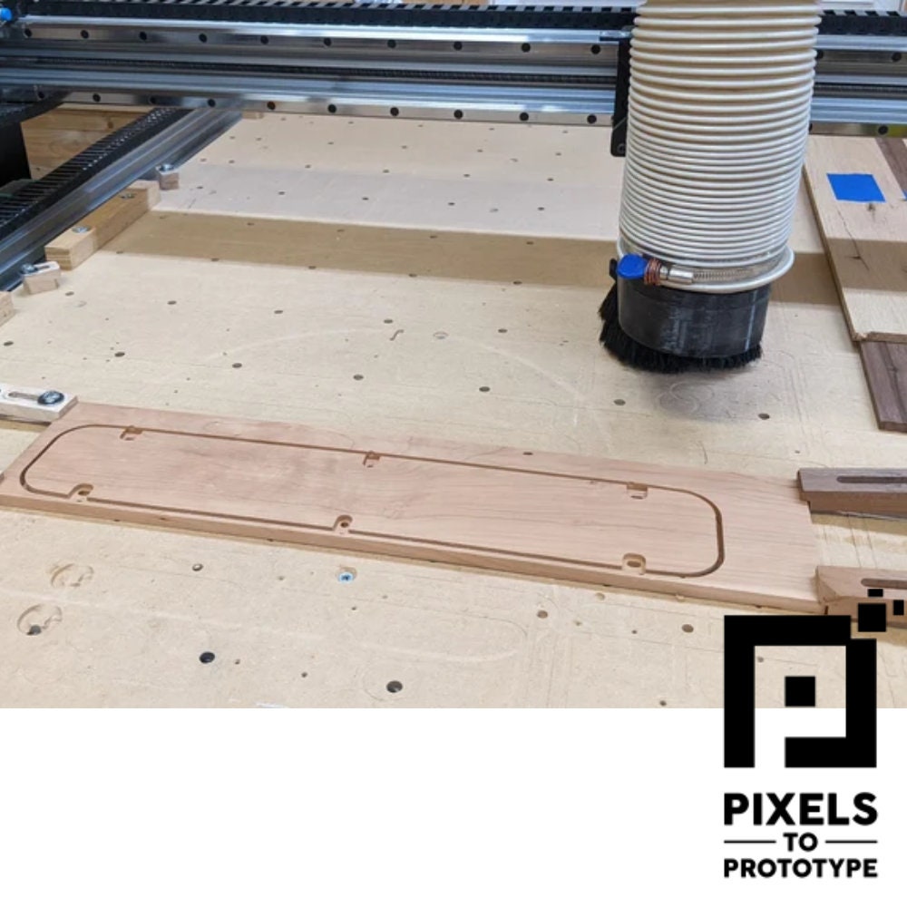 A DeWalt DWS779 Type 22 hardwood zero clearance insert being machined on a CNC router in the P2P shop